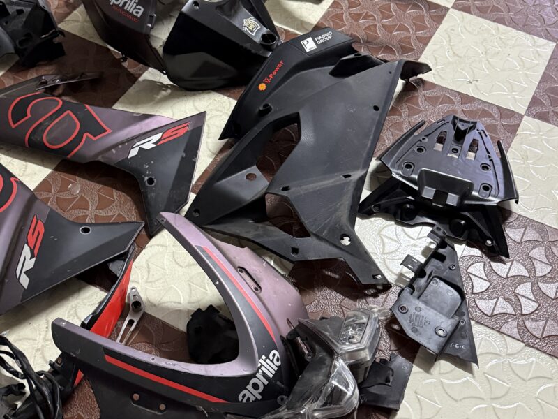 Rs457 Aprilia fairing ,instrument cluster and tvs euro grip front tyre rs457