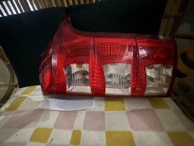 Car rear bumper and right side tail light