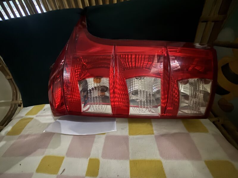 Car rear bumper and right side tail light