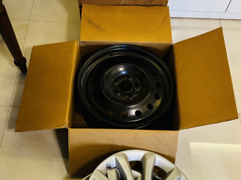 All 4 Brand New Stock (Steel) wheels with cover (Negotiable)