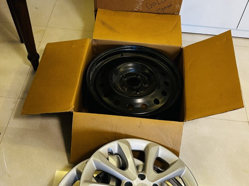 All 4 Brand New Stock (Steel) wheels with cover (Negotiable)